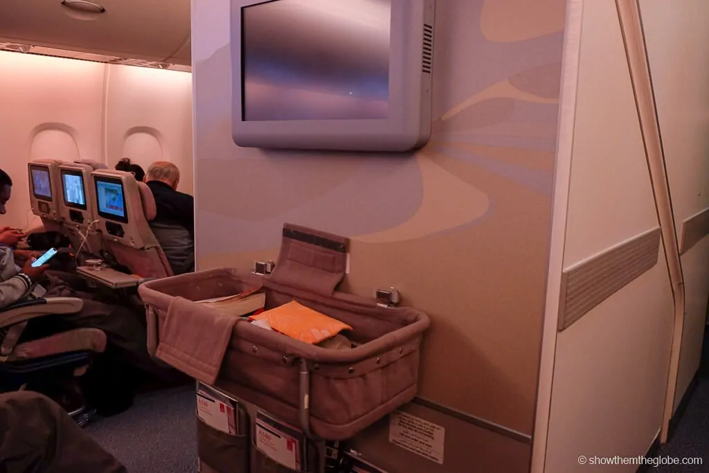 with a baby: Emirates with an | Show The Globe